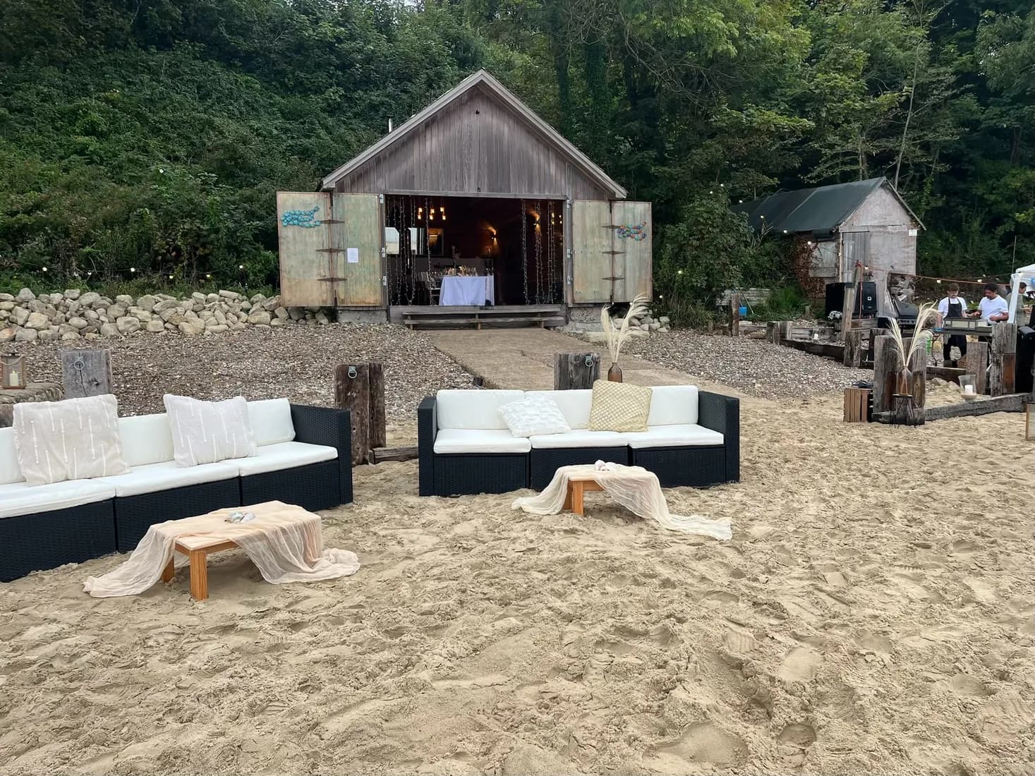 A bespoke hospitality setting prepared beside the sea